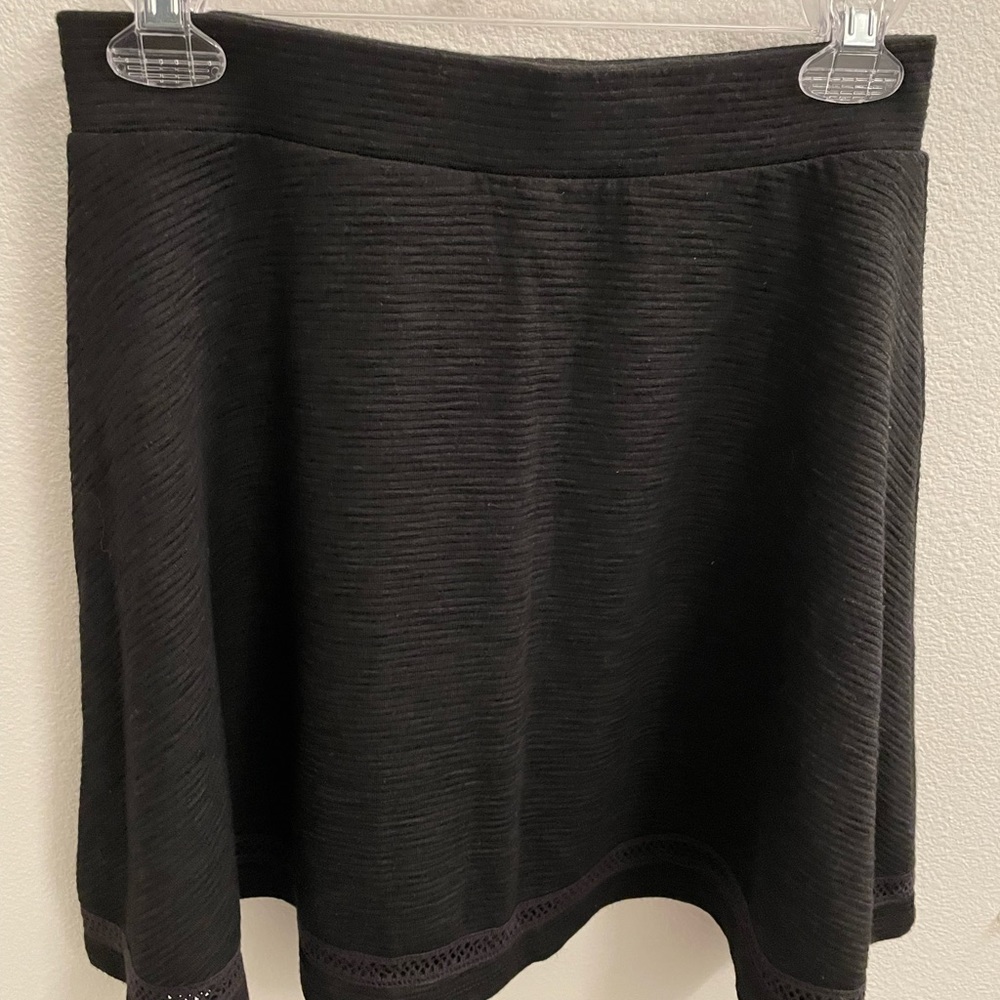 A superdry black mini skirt